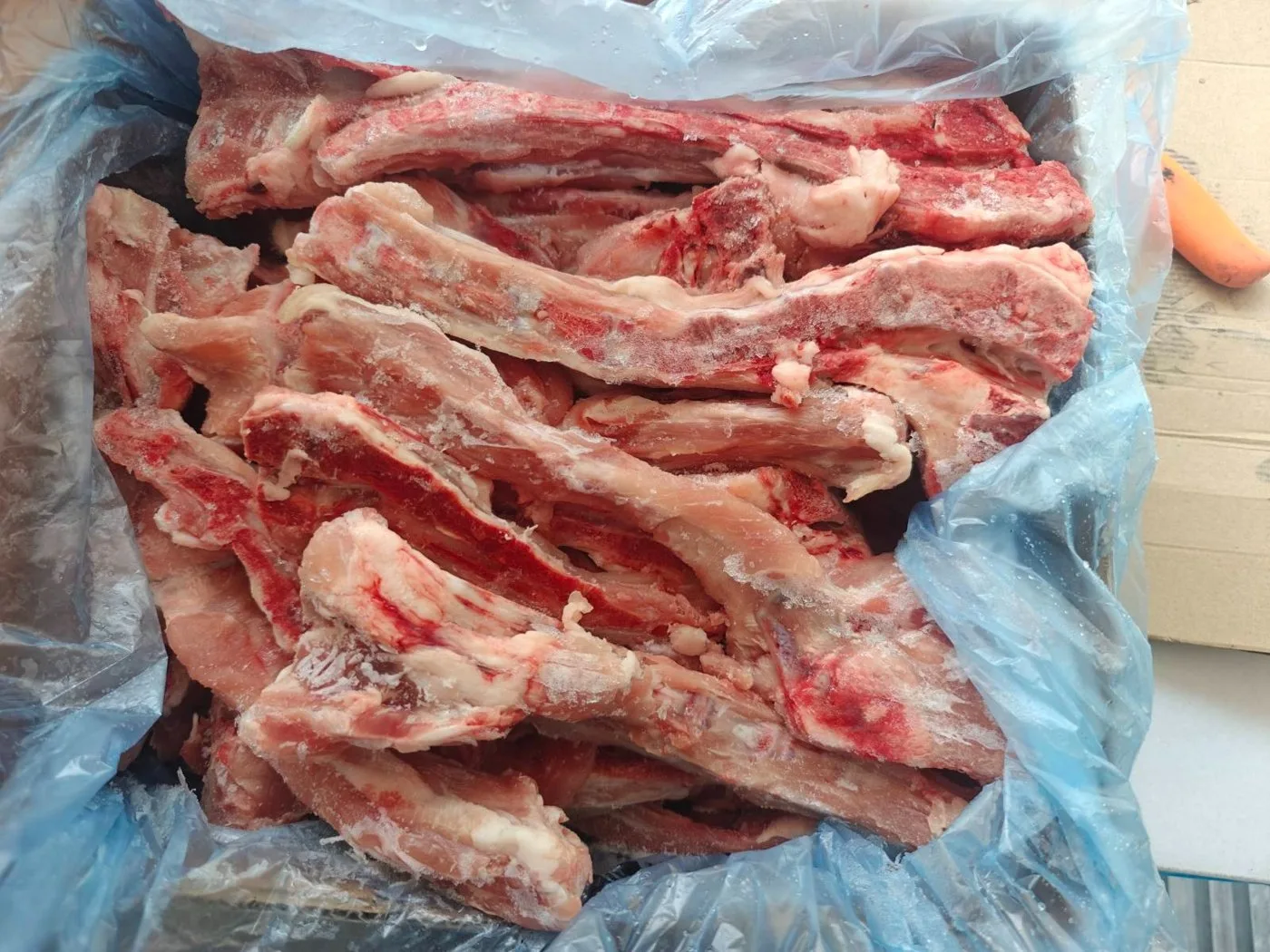 Os de queue de porc congelés – carton avec sachet PE